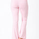 Pink flared pants on a white background