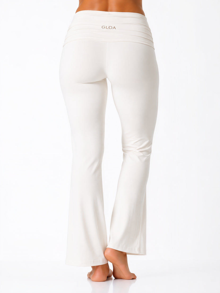 White pants with 'GLOA' branding on a white background