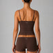 Woman wearing a brown lingerie set with 'Gloa' branding on a gray background