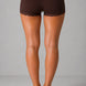 Brown lace-trimmed shorts with 'GLOA' branding on a gray background